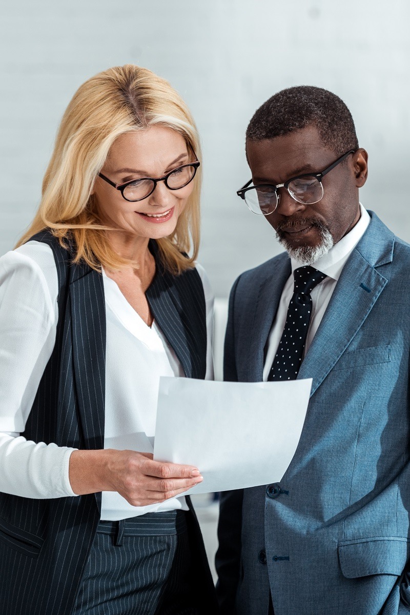 selective-focus-of-cheerful-businesswoman-and-afri-2023-11-27-04-49-55-utc (1)